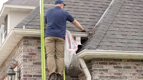 Safety first when cleaning gutters.